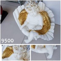 Ангел в ракушке