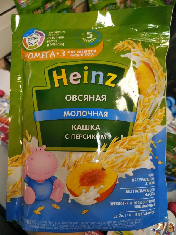 Каша HEINZ  молочная пшеничная каша с персиком 200гр.