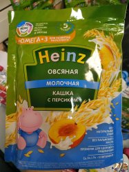 Каша HEINZ  молочная пшеничная каша с персиком 200гр.