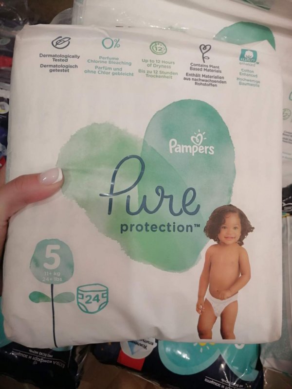 Подгузники Pampers PURE PROTECTION (4) 9-14 кг. 28 штук