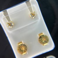 Пирсинг (2 мочки) пистолетом + набор пусет