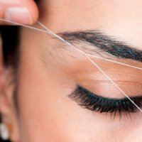 Депиляция всего лица нитью (тридинг)